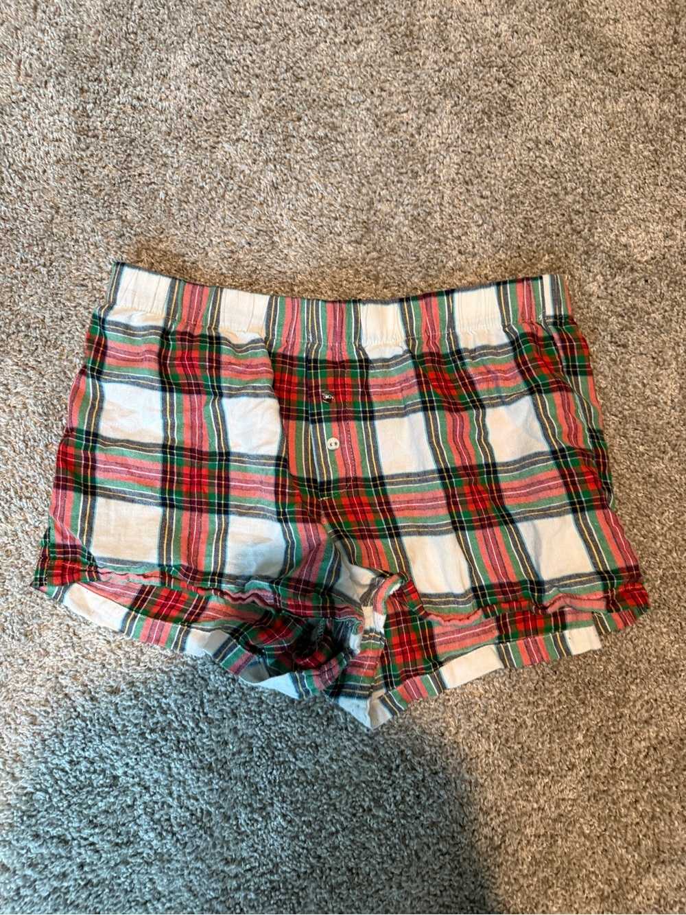 stars above Red, Green and White Plaid Athletic Shorts